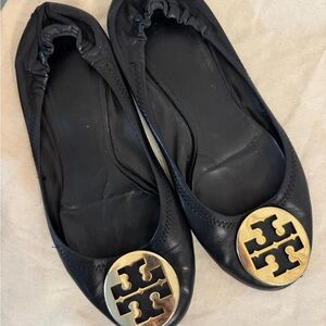 Tory Burch Black Flats with Gold Emblem